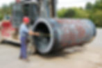 Large hollow forging measured by an employee