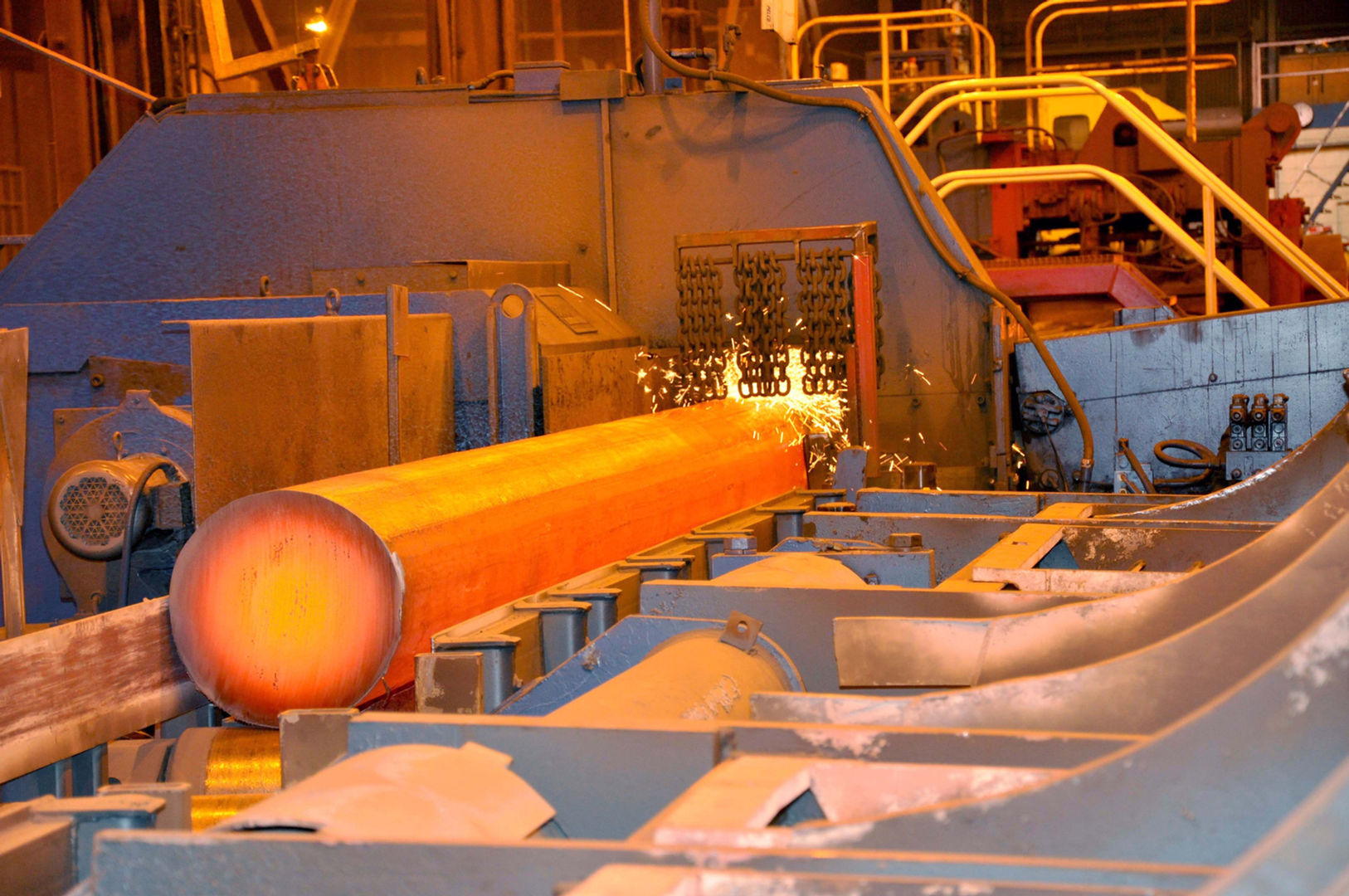 Hot steel baron a conveyer belt at  Scot Forge, Clinton manufacturing plant.