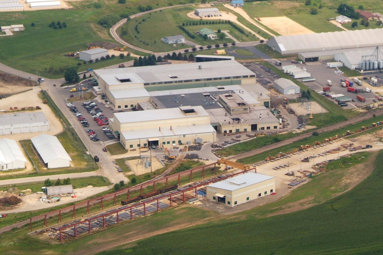 Aerial view of Scot Forge manufacturing facilities in Clinton, WI, buildings and parking lots.